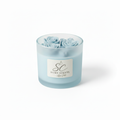 Soft blue frosted glass floral top candle with sculpted blue wax roses on white background